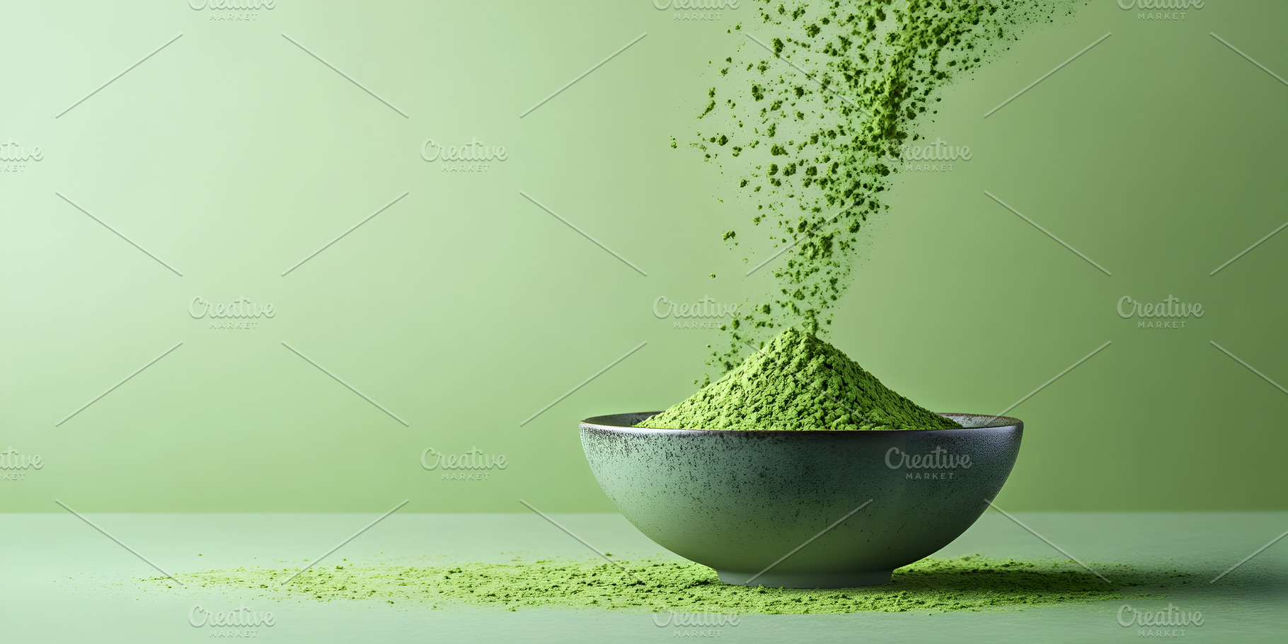 Green matcha powder falling into bow, a Food & Drink Photo by Photostock