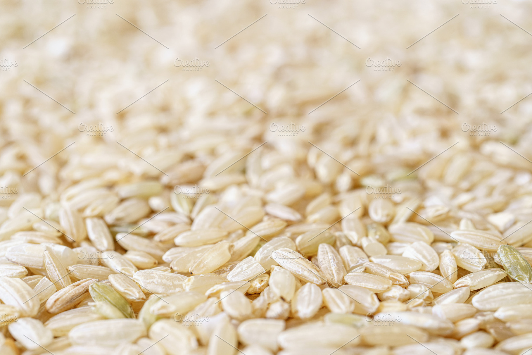 Full frame close up texture of brown rice for food and nutrition background hea, a Food & Drink Photo by Eugene_Photo