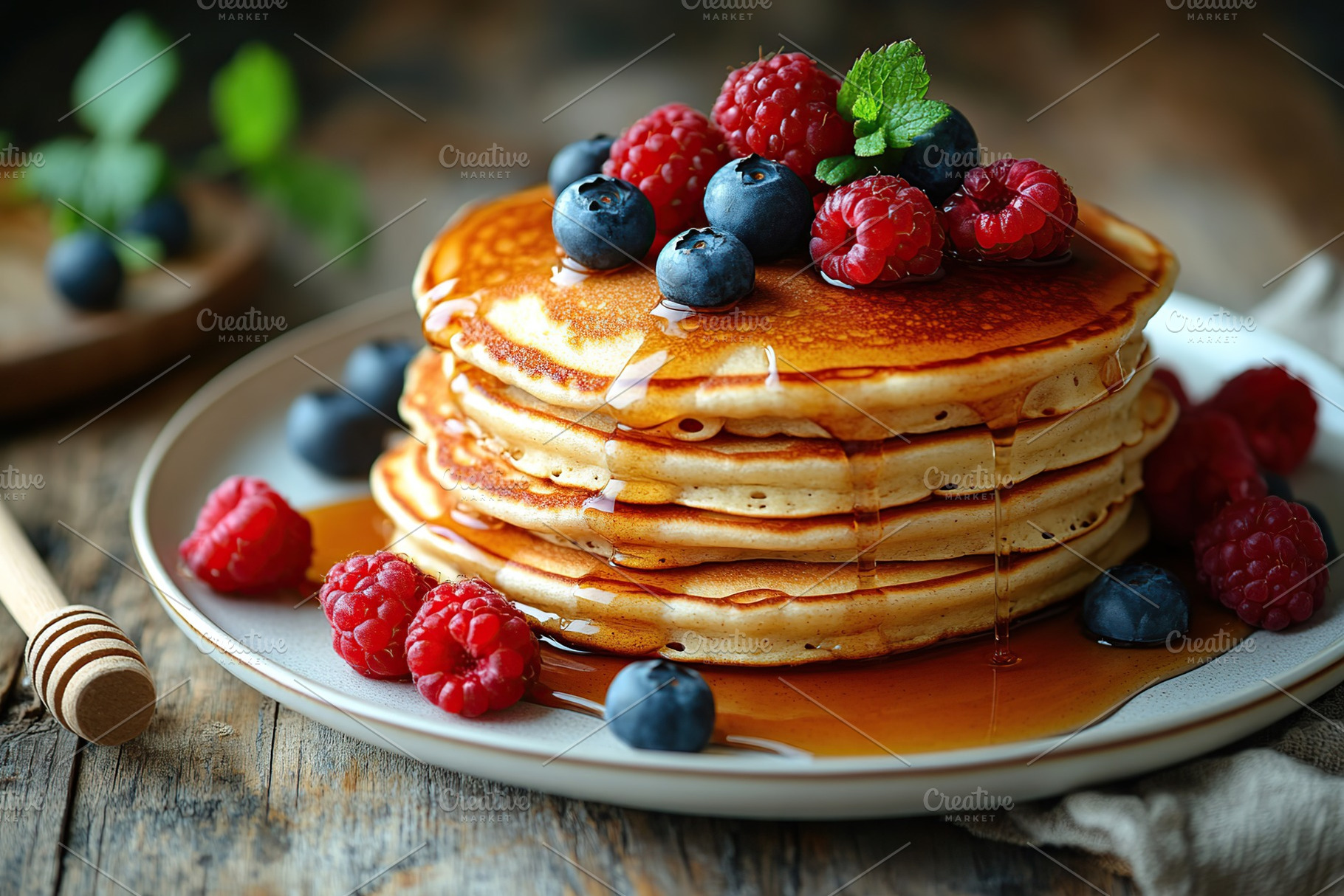 Delicious pancakes stacked high with fresh berries and sweet syrup on a rustic, a Food & Drink Photo by AlyaAnd