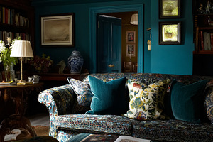 Eclectic interior design featuring a dark teal walled maximalist, a Photo by Studio ANNA