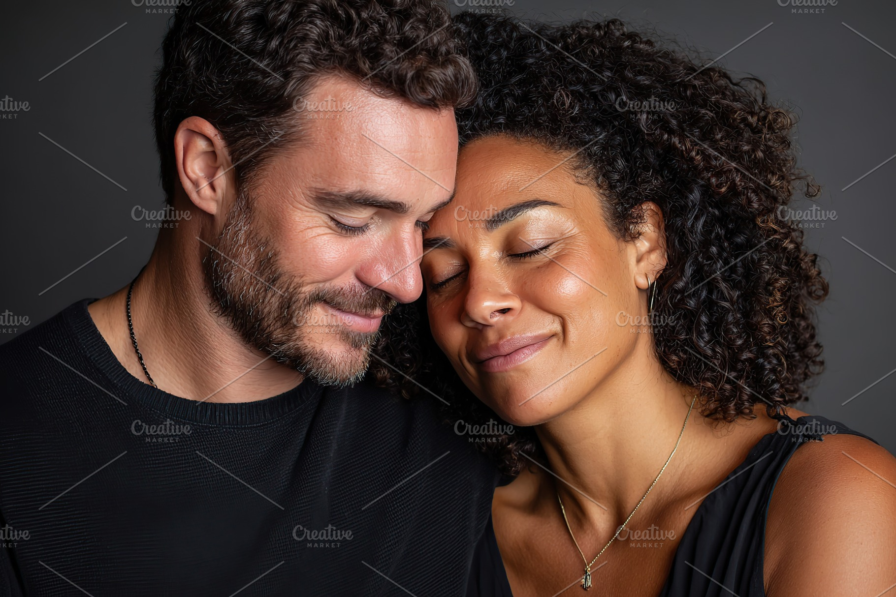 Couple enjoying a tender moment in a cozy indoor setting with soft lighting, a Photo by AlyaAnd
