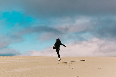 Sand dunes stock photo containing sand dunes and girl walking