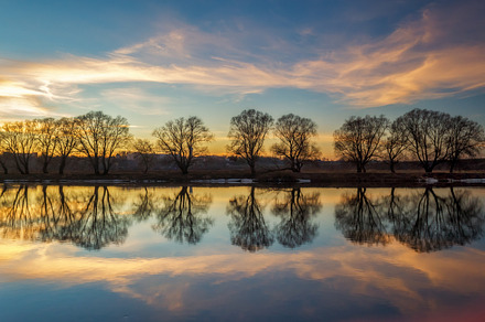 Water reflection landscape stock photo containing river and lake