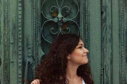 Beautiful positive girl in old city