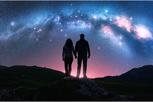 Silhouettes of couple, night sky, a Nature Photo by den-belitsky