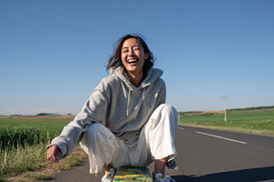 Young woman enjoys a skateboard ride, a Photo by Beautiful things