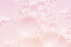 Foamed surface of pink liquid soap