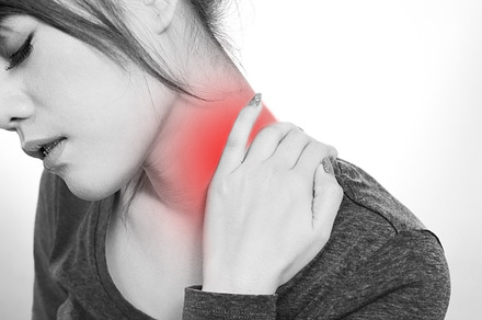 Woman have a neck pain containing pain, neck, and discomfort, a Person Photo by theerapoll