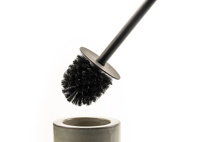 Hand with toilet brush