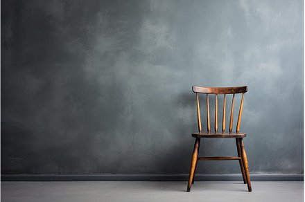 Old wooden chair standing in empty, a Background Photo by Ylivdesign