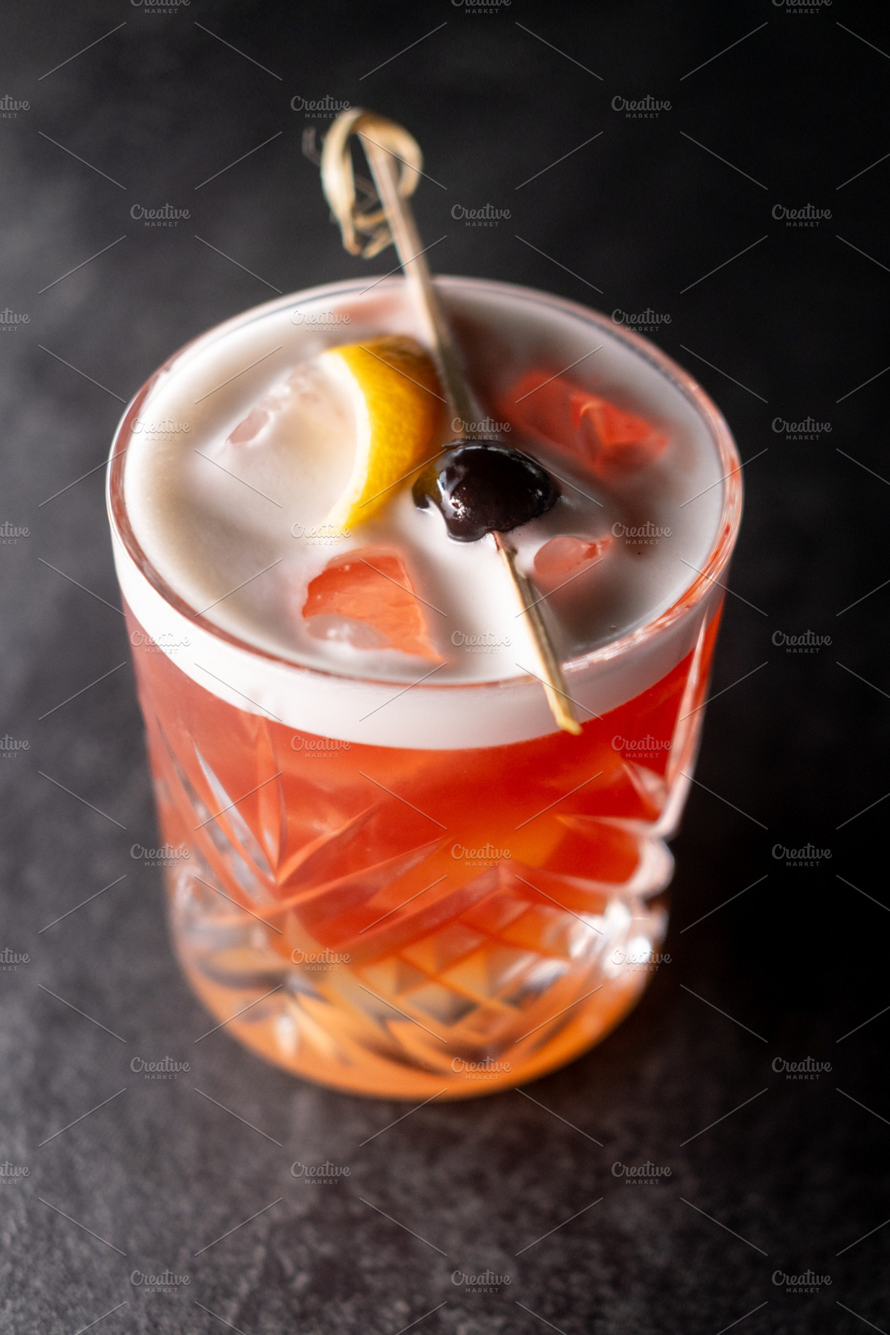 Alcoholic drink aperitif glass sour cocktail foam, a Food & Drink Photo by Photo Drive Studio