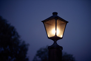 Street lantern containing illuminated, iron, and lamp