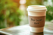 Mockup of a take-away coffee cup, a Cups & Container Mockup by VetalStock (Thumbnail 2 of 2)