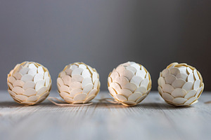 Four white decorative ball lights in, a Wallpaper Photo by Imaginarium