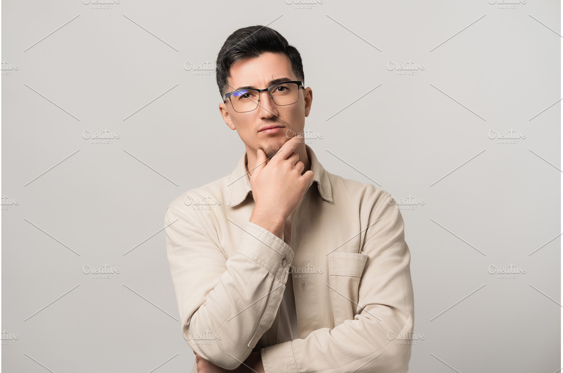 Deep in thought. A man in eyeglasses, a Person Photo by AD Stock Images