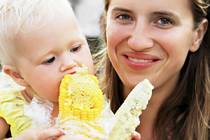 Baby and corn, a Photo by saiko3p