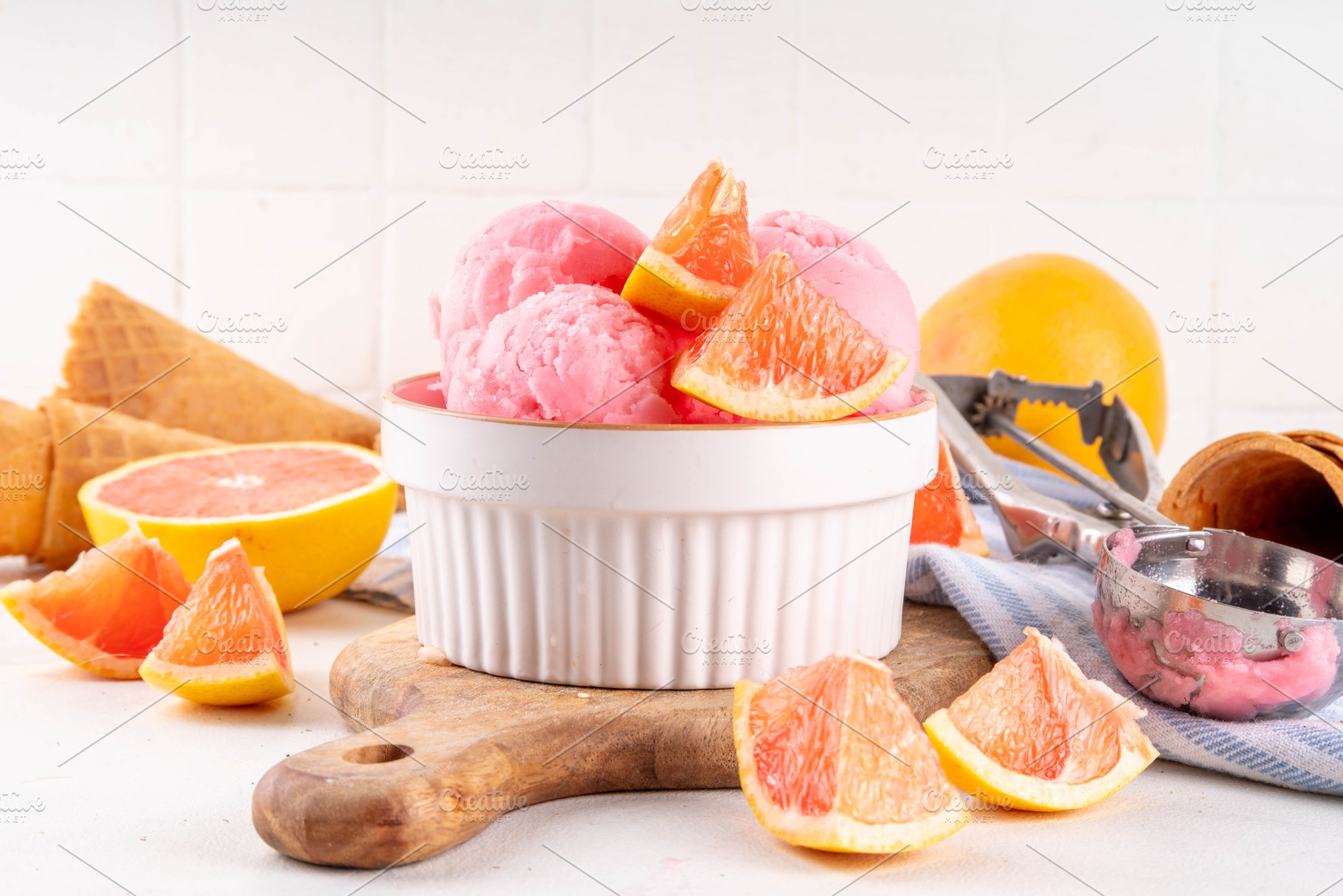 Tasty grapefruit ice cream, fruit citrus sorbet dessert, a Food & Drink Photo by Rimma