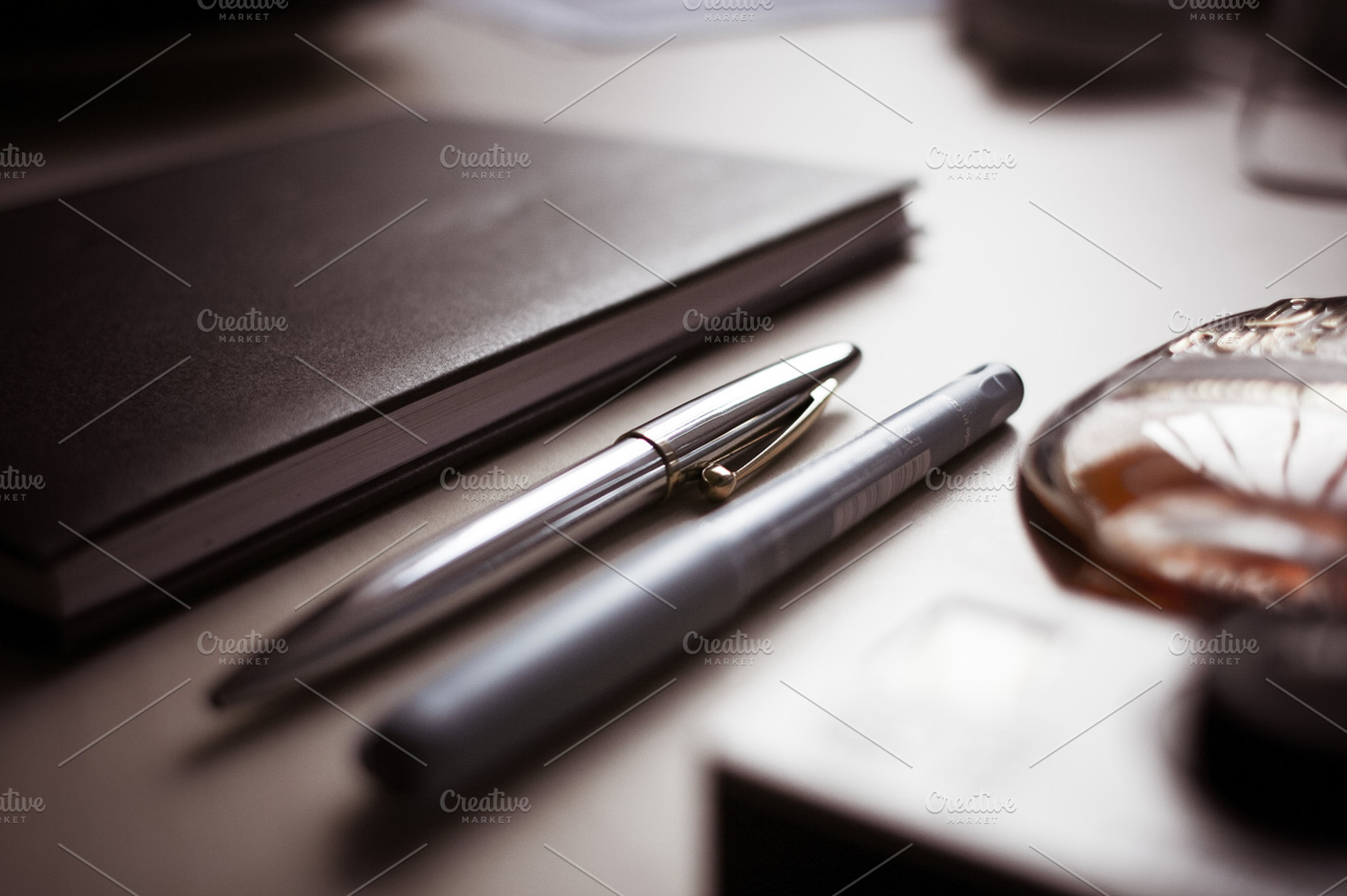 Diary with pens stock photo containing desk and music