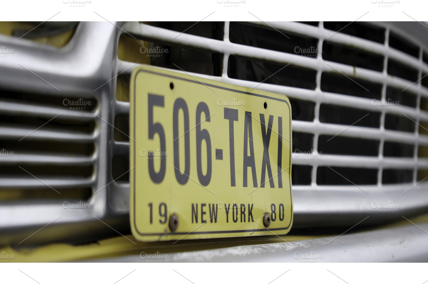 Yellow cab license plate from 1980, a Transportation Photo by Media Whale Stock