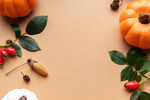 Autumn harvest festival flat lay with pumpkins and leaves