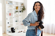 Cheerful Arabic Photographer Woman Holding Photo Camera Indoors, a Photo by Prostock-Studio (Thumbnail 3 of 3)