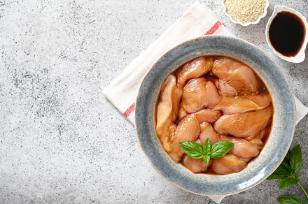 Raw diet marinated chicken meat, a Food & Drink Photo by Ivanna
