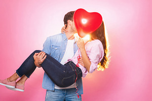 Couple Kissing Behind Heart Shaped Balloon, a Person Photo by Davizro's Market