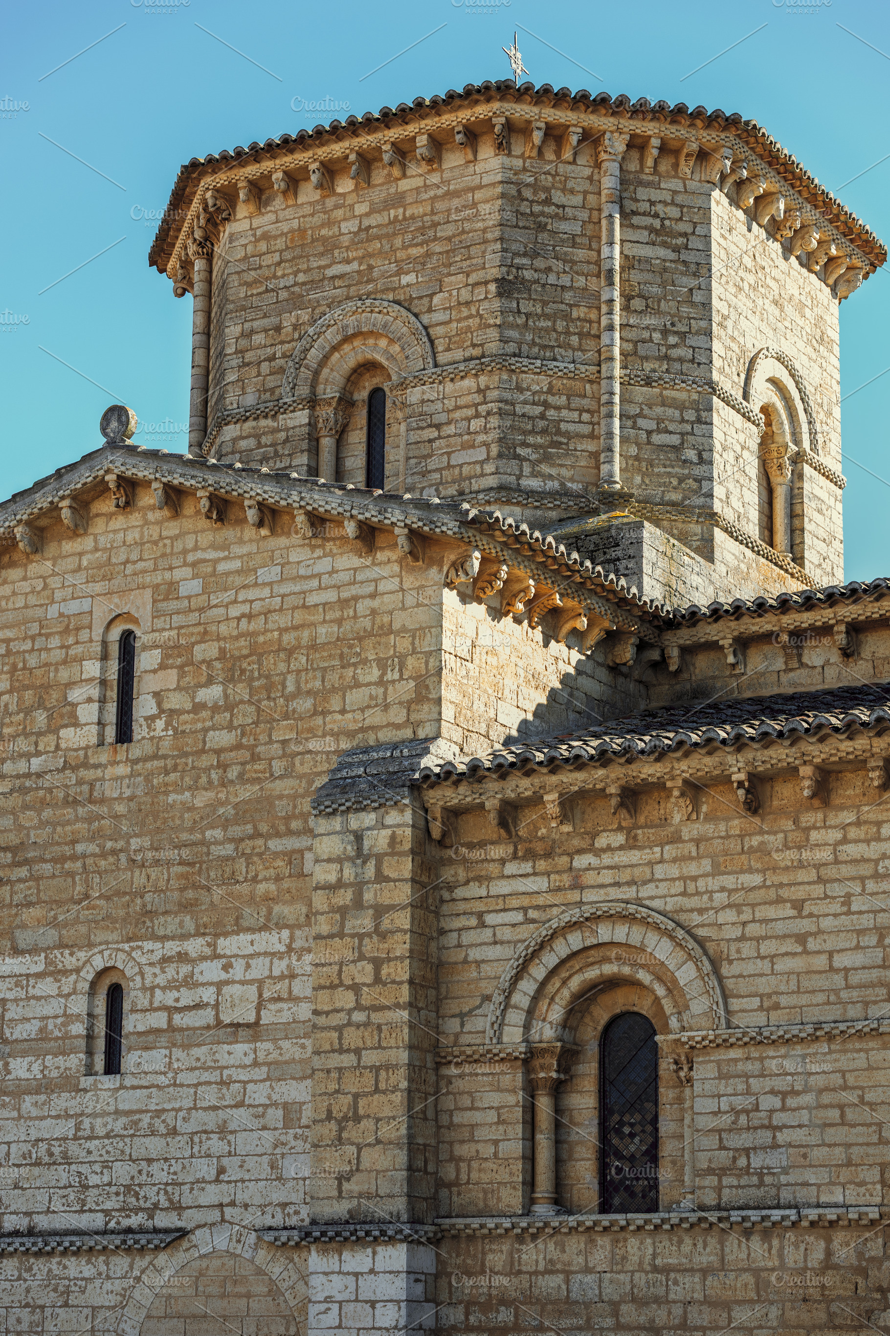 Apse and tower of a Romanesque stone, an Architecture Photo by Perpis