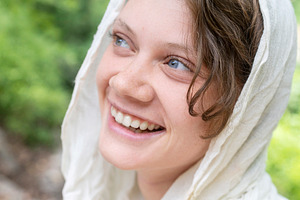 A portrait of a smiling young woman, a Person Photo by Imaginarium