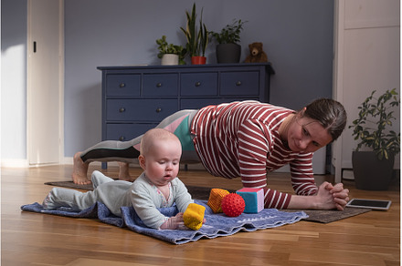Mother with baby make yoga at home, a Sports & Recreation Photo by Koldunova