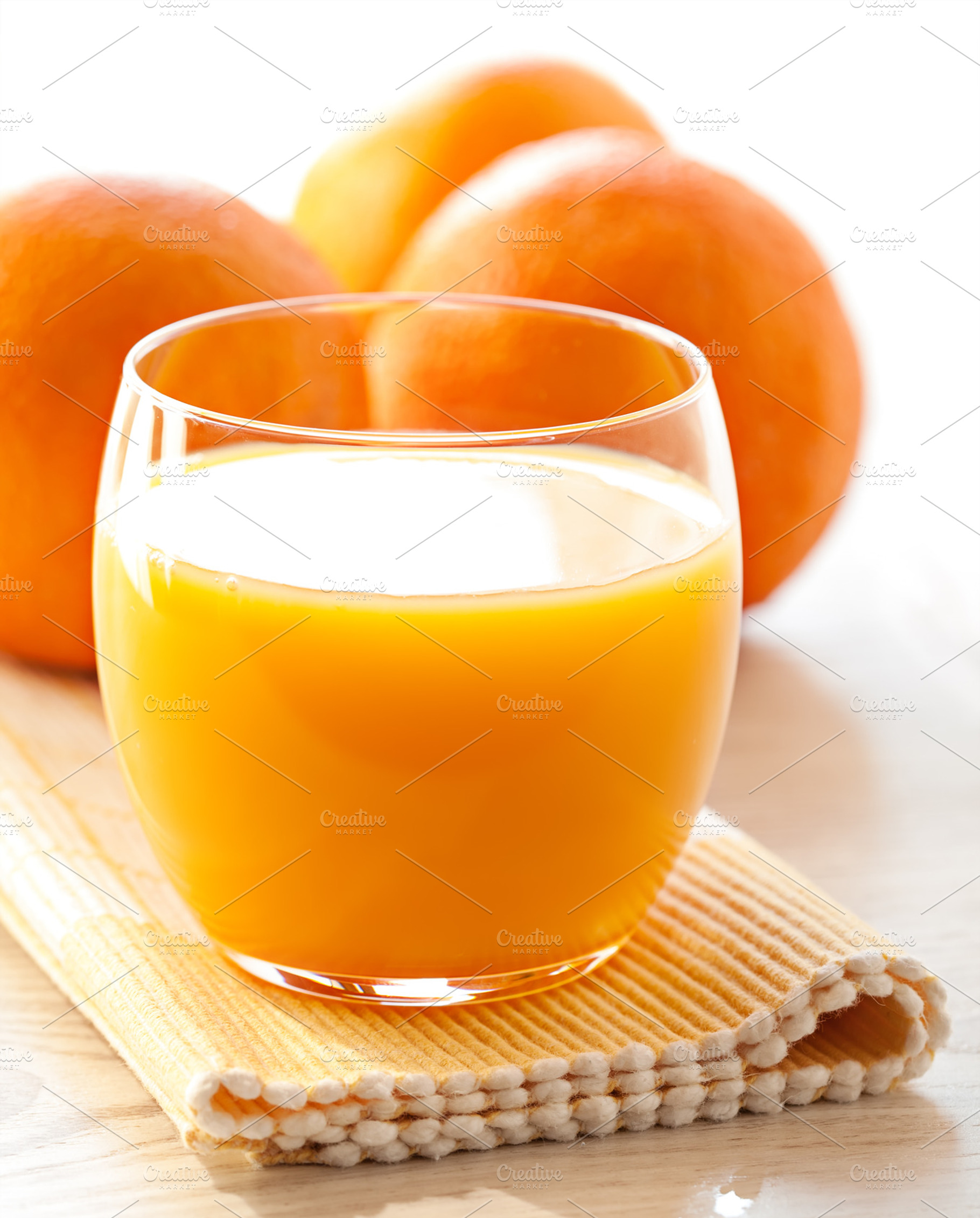 Glass of orange juice containing background, beverage, and breakfast