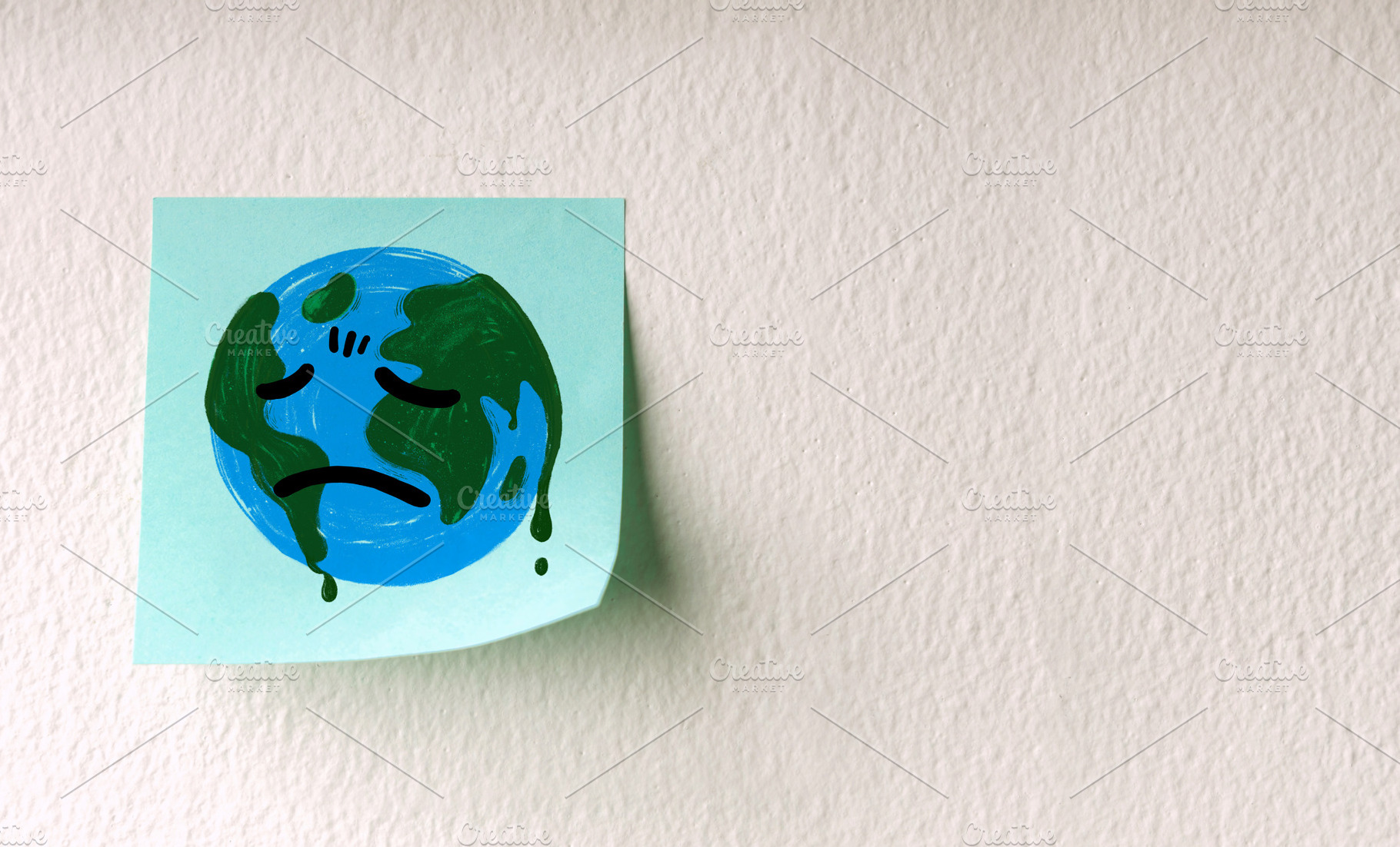 Sadness Globe drawn on Sticky Note Wall. Environmental Issue, a Photo by salmon.black