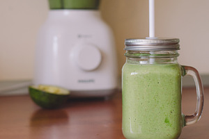 Fresh avocado smoothie stock photo containing avocado and background