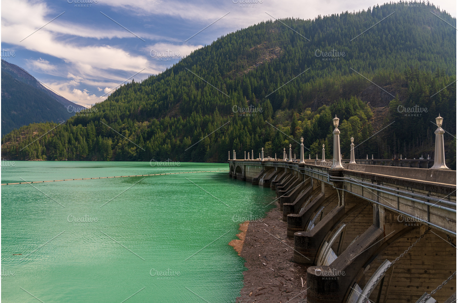 Side view of the Diablo Lake dam in, a Nature Photo by Backyard Stock