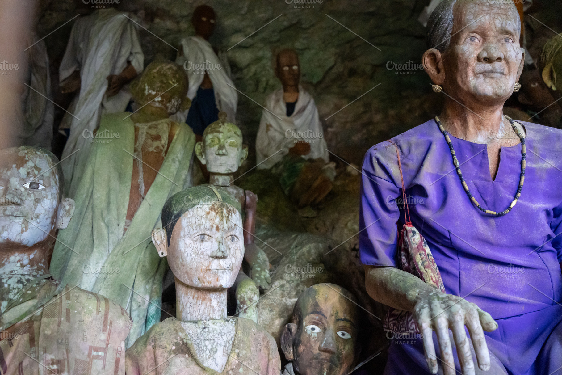 Tau Tau statues in funeral cave, Toraja land, Sulawesi, Indonesi, an Arts & Entertainment Photo by GoodGoods