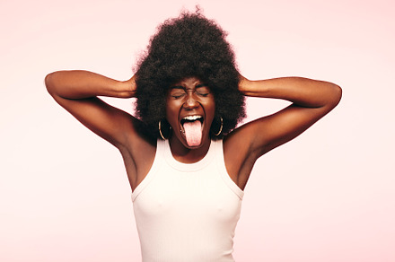 Woman screaming with her tongue out, a Person Photo by Stefan & Janni