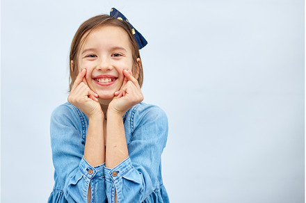 Smiling little girl make trend mini, a Person Photo by IlliaBondarPhotography
