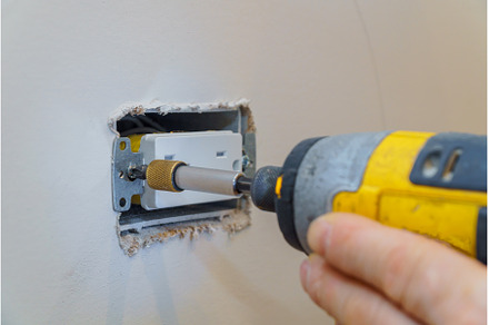 Preparing to install an electrical, an Industrial Photo by Ungvar Studio