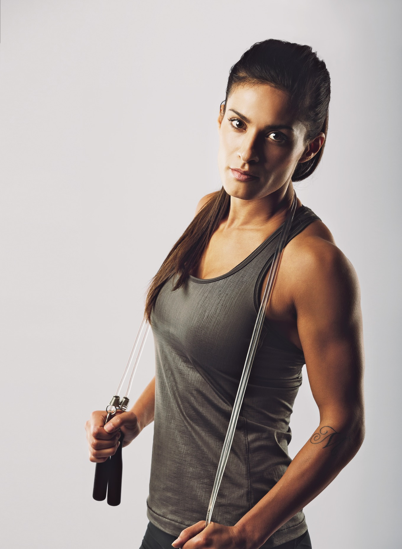 Female athlete posing with jump rope, a Sports & Recreation Photo by ...