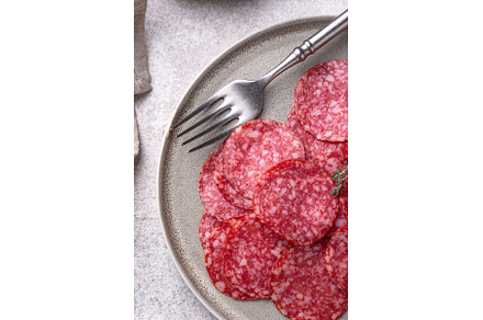 Sliced spicy tasty salami sausage