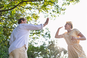 Happy couple giving each other a, a Person Photo by HalfPoint