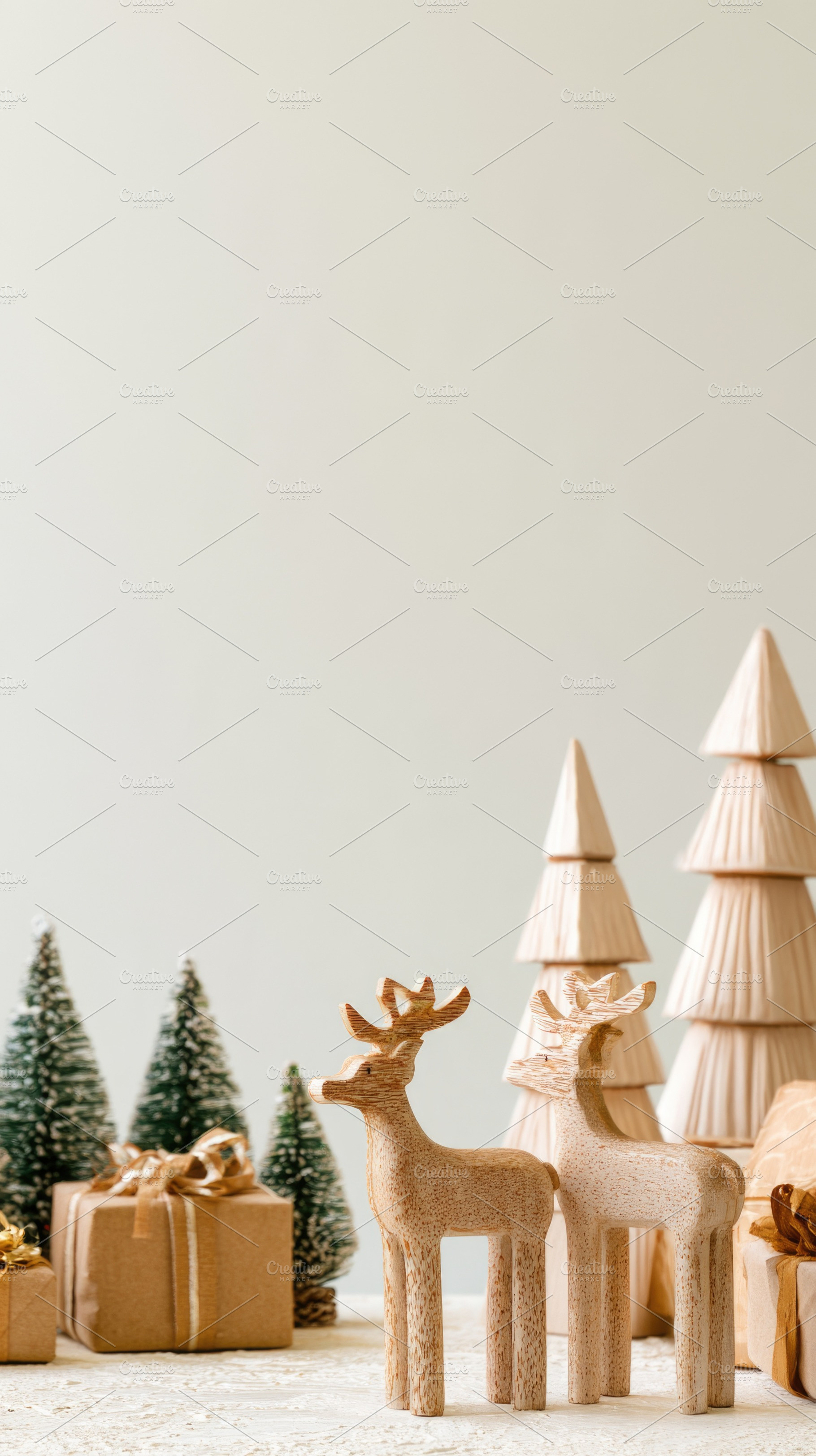 Christmas wooden reindeer in snowy winter scene with copy space, a Holiday Photo by José Manuel Gelpi