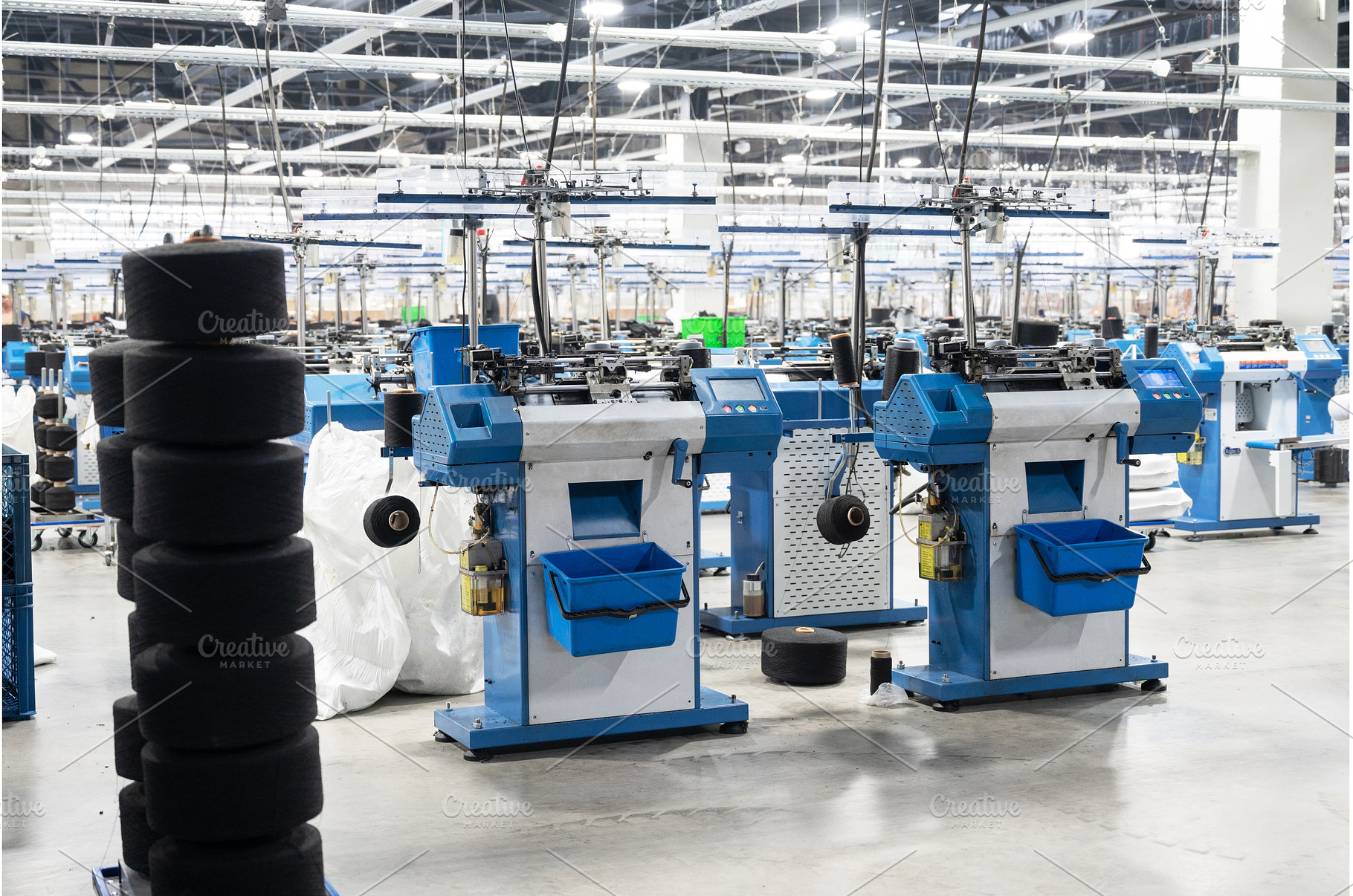 Textile Manufacturing Machines in, an Industrial Photo by Jan Jack Russo Media