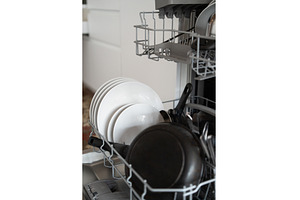 Dishwasher opening with freshly, a Technology Photo by volodymyrshtun13795