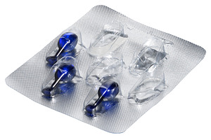 Blister pack with blue cosmetic or medicinal capsules on an isol, a Health & Medical Photo by ndanko