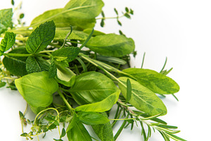 Fresh aromatic herbs mix on white background, a Food & Drink Photo by Olena Rudo