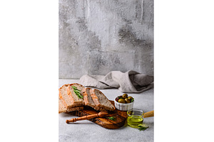 Fresh bread, olive oil and mix of, a Food & Drink Photo by Yulia Furman