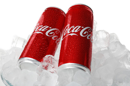 Odessa, Ukraine - September 23, 2021: Coca - cola cans in ice is
