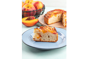 Piece of nectarine peach cake on, a Food & Drink Photo by Lifemorning
