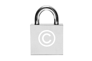 Silver padlock with copyright sign, a Photo by saiko3p